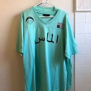 Men’s Black Scale XL Jersey T-shirt turquoise.